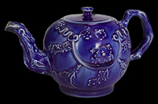 Littler-Wedgwood Blue molded teapot  with floral and grapevine sprig molding. The teapot has a crabstock handle and spout from private collection.
